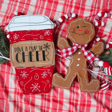 Christmas in July post header - coffee cup and gingerbread man mad out of wood